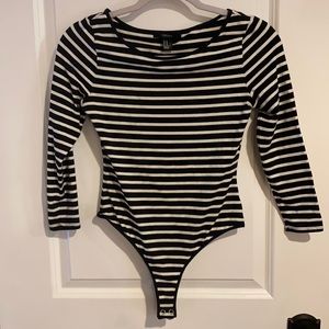 Black and white stripped long sleeve onesie